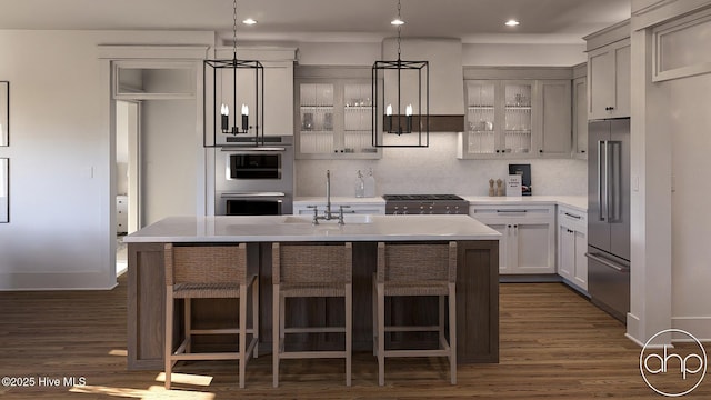 135 Forest Walk SW, Sunset Beach, NC 28468 - kitchen featuring stainless steel appliances, glass insert cabinets, recessed lighting, dark wood-style floors, and backsplash