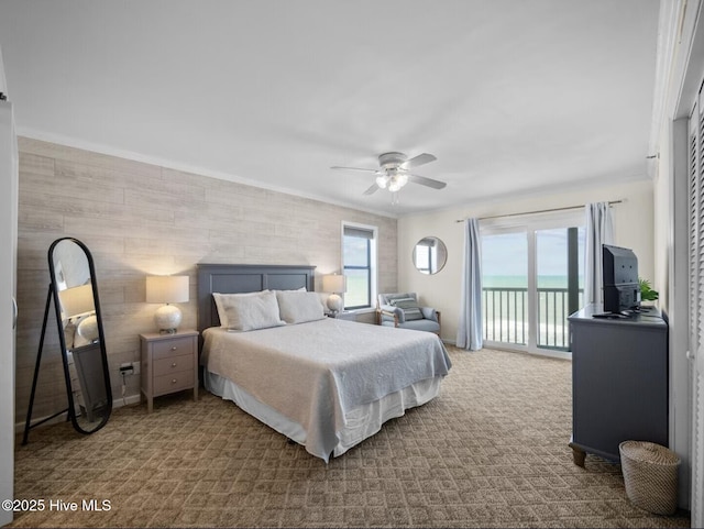 1896 New River Inlet Rd Unit 1310, North Topsail Beach, NC 28460 - carpeted bedroom with access to outside, a ceiling fan, and ornamental molding