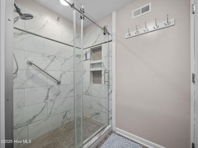 1896 New River Inlet Rd Unit 1310, North Topsail Beach, NC 28460 - full bath featuring a marble finish shower and baseboards