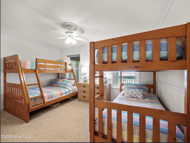 1896 New River Inlet Rd Unit 1310, North Topsail Beach, NC 28460 - bedroom with carpet flooring, crown molding, and ceiling fan