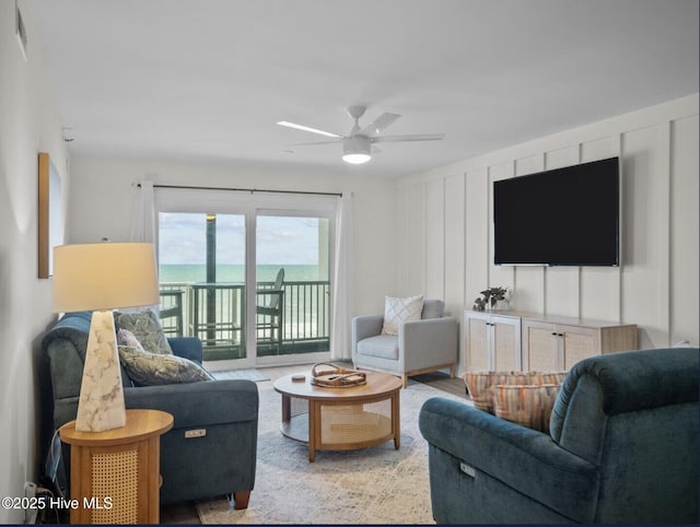 1896 New River Inlet Rd Unit 1310, North Topsail Beach, NC 28460 - living room featuring a ceiling fan