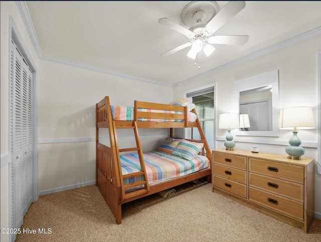 1896 New River Inlet Rd Unit 1310, North Topsail Beach, NC 28460 - bedroom featuring light colored carpet, crown molding, a closet, and a ceiling fan