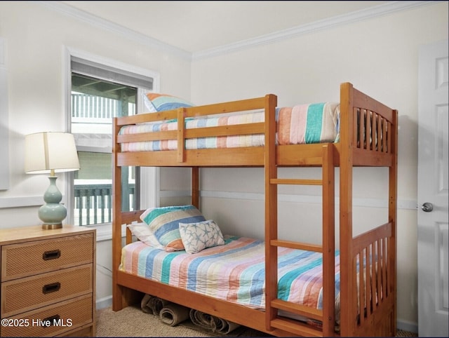 1896 New River Inlet Rd Unit 1310, North Topsail Beach, NC 28460 - bedroom with ornamental molding and carpet floors
