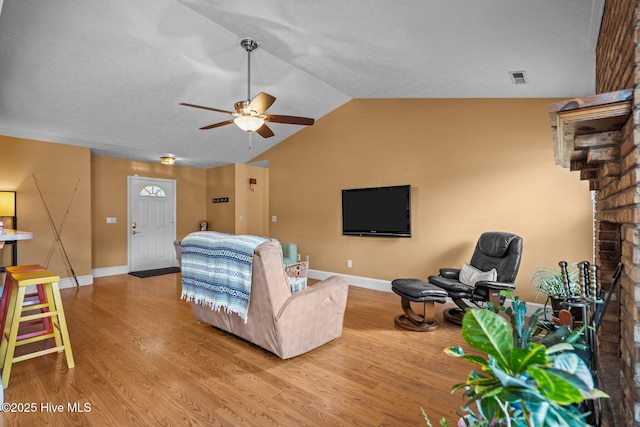 1005 Pleasant Dale Dr, Wilmington, NC 28412 - living area with a ceiling fan, wood finished floors, and vaulted ceiling
