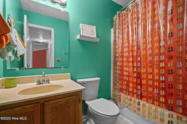 1005 Pleasant Dale Dr, Wilmington, NC 28412 - bathroom featuring vanity, a textured ceiling, and shower / bath combination with curtain