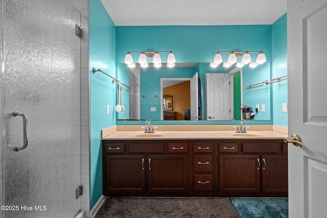 1005 Pleasant Dale Dr, Wilmington, NC 28412 - bathroom featuring double vanity and a shower stall