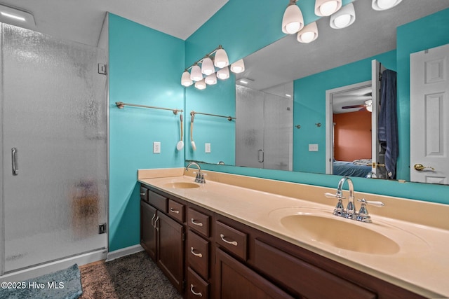 1005 Pleasant Dale Dr, Wilmington, NC 28412 - bathroom featuring ensuite bath, a stall shower, double vanity, and a ceiling fan