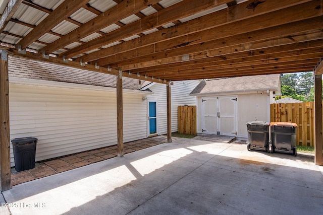 1005 Pleasant Dale Dr, Wilmington, NC 28412 - view of patio featuring a storage unit
