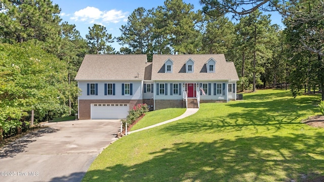 7405 Chickadee Ct, Sanford, NC 27332 - cape cod house with concrete driveway, a garage, and a front yard