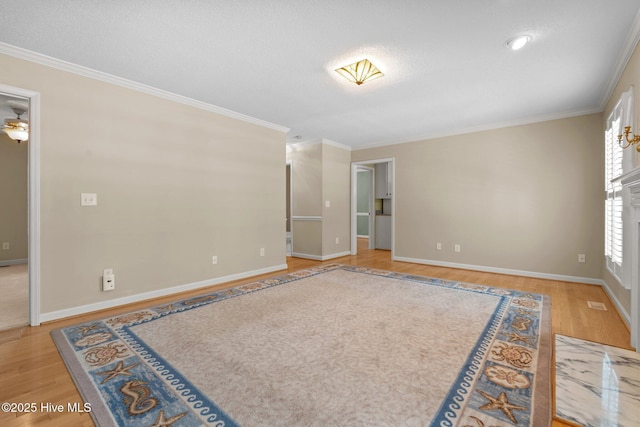 7405 Chickadee Ct, Sanford, NC 27332 - unfurnished room featuring wood finished floors, crown molding, and a textured ceiling