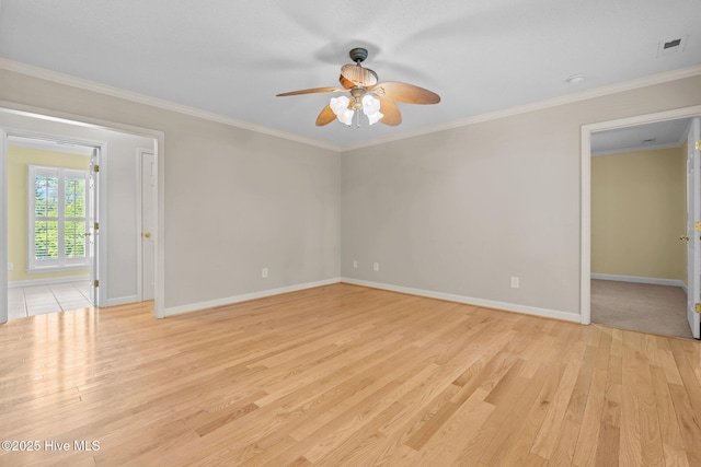 7405 Chickadee Ct, Sanford, NC 27332 - empty room featuring ceiling fan, light wood finished floors, and ornamental molding
