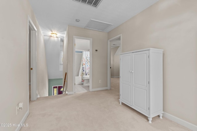 7405 Chickadee Ct, Sanford, NC 27332 - unfurnished bedroom featuring light colored carpet, attic access, and ensuite bath