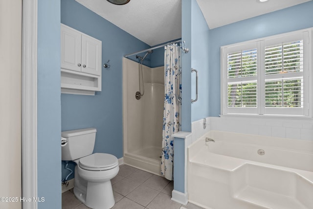 7405 Chickadee Ct, Sanford, NC 27332 - full bathroom with a garden tub, tile patterned flooring, and a shower stall