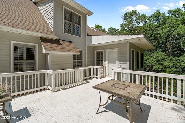 7405 Chickadee Ct, Sanford, NC 27332 - wooden deck with outdoor dining area