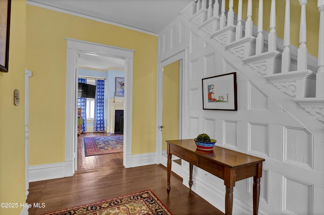 415 S 3rd St, Wilmington, NC 28401 - hall with dark wood-style floors and crown molding
