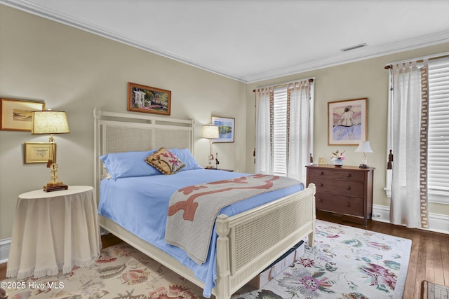 415 S 3rd St, Wilmington, NC 28401 - bedroom with hardwood / wood-style floors and ornamental molding