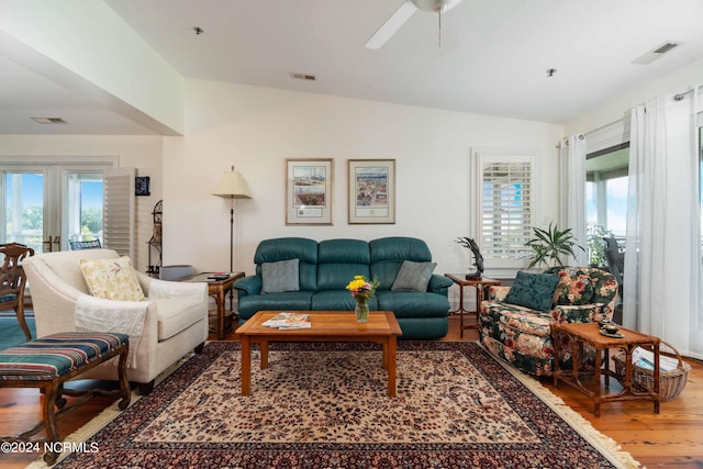 300 Midyette St Unit A15, Oriental, NC 28571 - living area featuring wood finished floors, plenty of natural light, a ceiling fan, lofted ceiling, and french doors