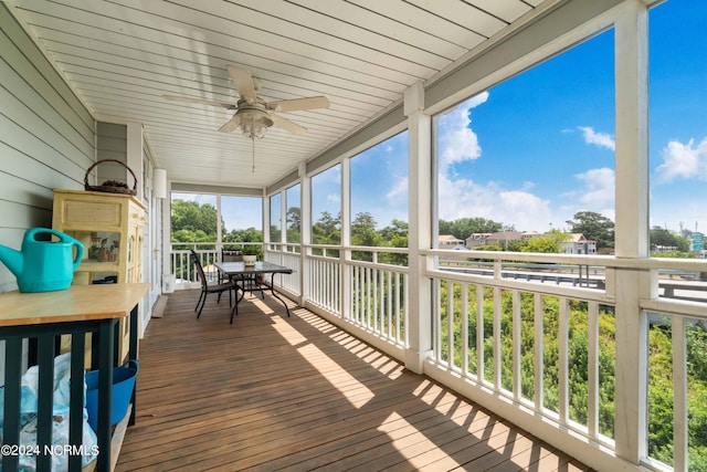 300 Midyette St Unit A15, Oriental, NC 28571 - wooden deck with ceiling fan and outdoor dining area