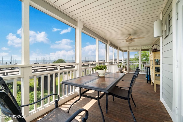 300 Midyette St Unit A15, Oriental, NC 28571 - sunroom featuring ceiling fan and outdoor dining space