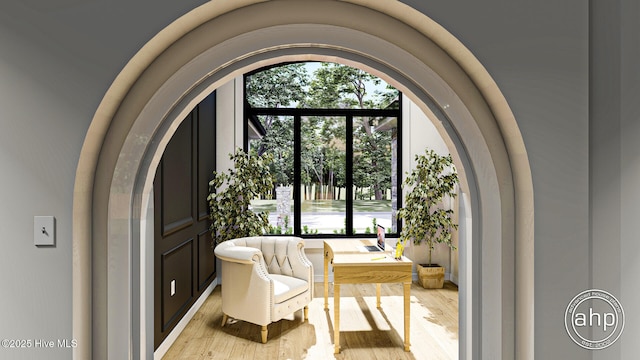 243 W Winding Way, Wallace, NC 28466 - living area with light wood finished floors and arched walkways
