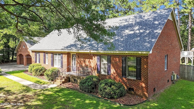 212 Evanswood Dr, Greenville, NC 27858 - view of front facade featuring a shingled roof, crawl space, and brick siding
