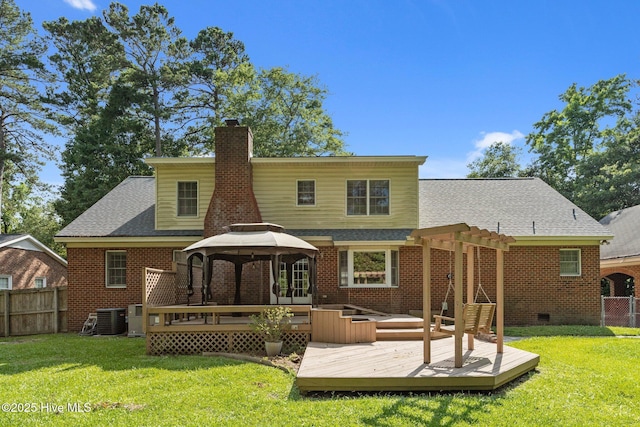 212 Evanswood Dr, Greenville, NC 27858 - back of house featuring a gazebo, a chimney, a wooden deck, and brick siding
