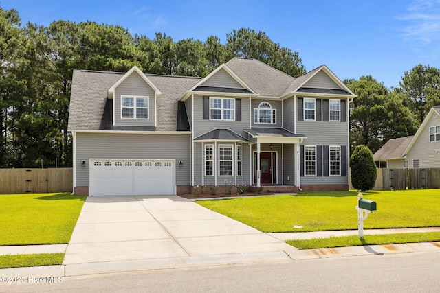 324 Foster Creek Rd, Swansboro, NC 28584 - view of front facade featuring concrete driveway and a garage