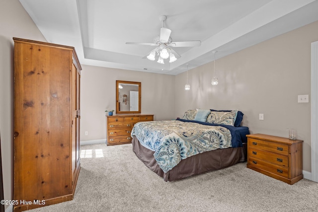 324 Foster Creek Rd, Swansboro, NC 28584 - carpeted bedroom with a raised ceiling and ceiling fan
