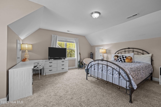 324 Foster Creek Rd, Swansboro, NC 28584 - bedroom featuring lofted ceiling, light colored carpet, and a desk