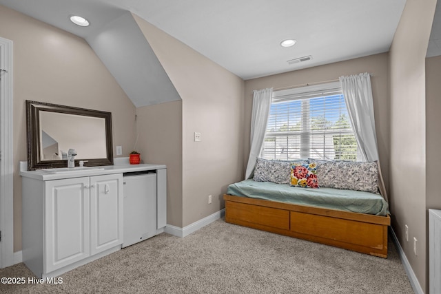 324 Foster Creek Rd, Swansboro, NC 28584 - living area featuring light colored carpet, recessed lighting, and vaulted ceiling