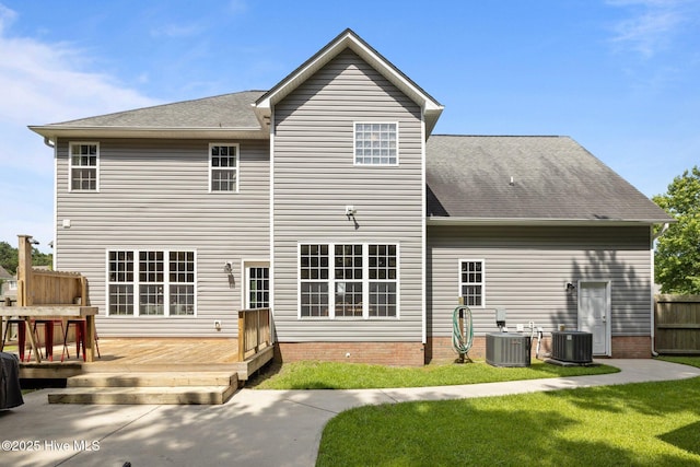 324 Foster Creek Rd, Swansboro, NC 28584 - rear view of house featuring a wooden deck and a shingled roof