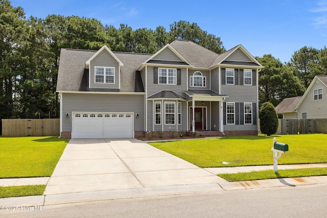 324 Foster Creek Rd, Swansboro, NC 28584 - view of front of home featuring driveway, a garage, and a shingled roof