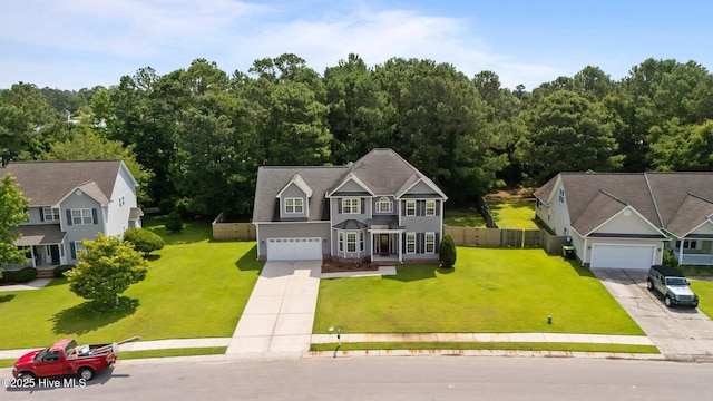 324 Foster Creek Rd, Swansboro, NC 28584 - colonial inspired home featuring concrete driveway and a garage