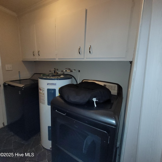 204 Tyree Rd, Kinston, NC 28504 - laundry room with electric water heater, washer / clothes dryer, ornamental molding, and dark tile patterned flooring