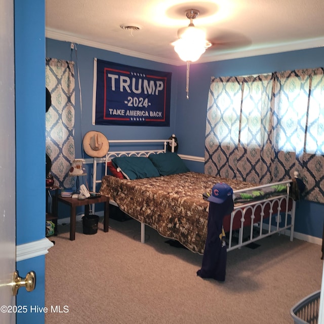 204 Tyree Rd, Kinston, NC 28504 - bedroom featuring carpet flooring and crown molding