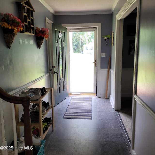 204 Tyree Rd, Kinston, NC 28504 - entryway featuring ornamental molding and a wainscoted wall