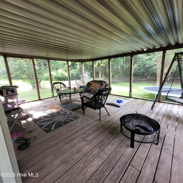 204 Tyree Rd, Kinston, NC 28504 - sunroom featuring an outdoor living space with a fire pit