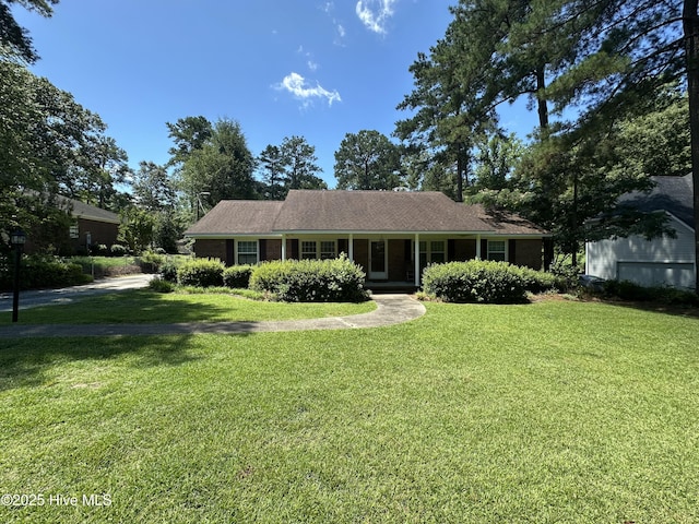 12760 S Pine Villa Dr, Laurinburg, NC 28352 - ranch-style house featuring a front yard
