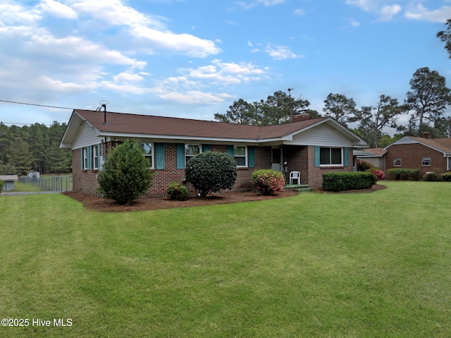 377 Louis Breeden Blvd, Hamlet, NC 28345 - single story home with brick siding