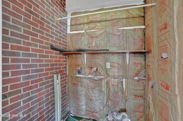 377 Louis Breeden Blvd, Hamlet, NC 28345 - laundry view of brick siding