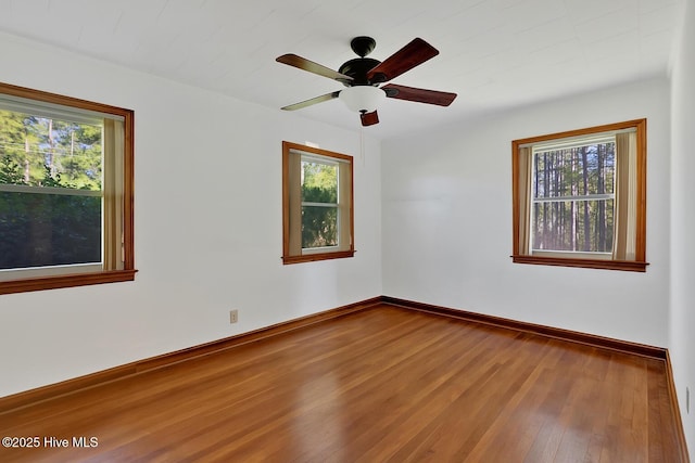 377 Louis Breeden Blvd, Hamlet, NC 28345 - spare room with wood finished floors and a ceiling fan