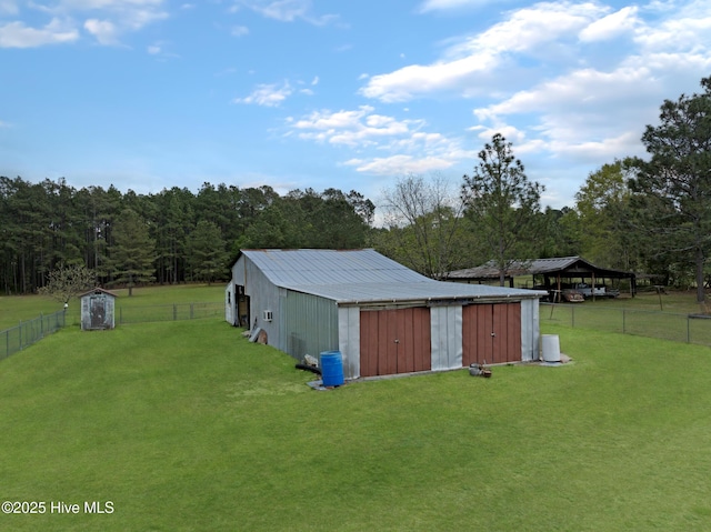 377 Louis Breeden Blvd, Hamlet, NC 28345 - view of yard with a storage unit