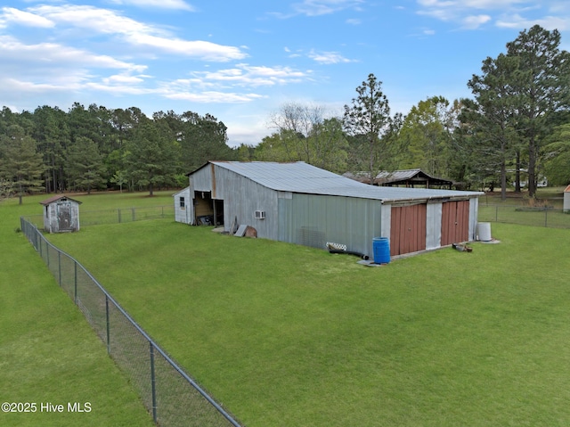 377 Louis Breeden Blvd, Hamlet, NC 28345 - view of yard with an outbuilding and a garage