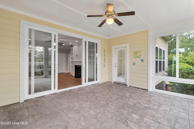 2955 Moorings Way SE, Southport, NC 28461 - unfurnished sunroom with ceiling fan