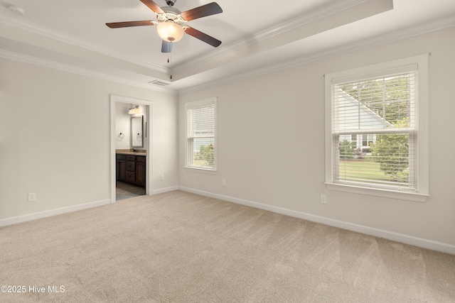 2955 Moorings Way SE, Southport, NC 28461 - carpeted spare room featuring crown molding, a raised ceiling, ceiling fan, and a smoke detector
