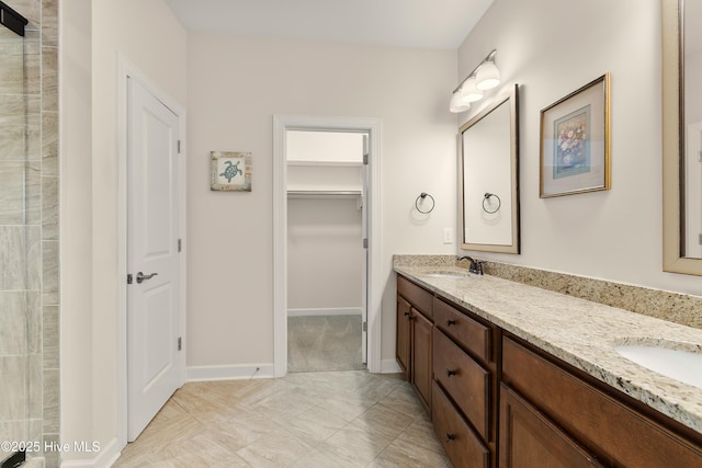 2955 Moorings Way SE, Southport, NC 28461 - bathroom featuring double vanity and a spacious closet
