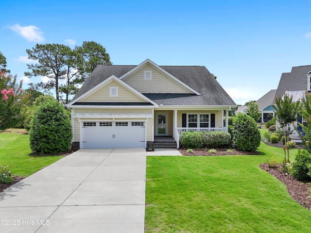 2955 Moorings Way SE, Southport, NC 28461 - craftsman-style home with a porch, a garage, a front lawn, and driveway