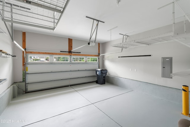 2955 Moorings Way SE, Southport, NC 28461 - garage featuring electric panel and a garage door opener