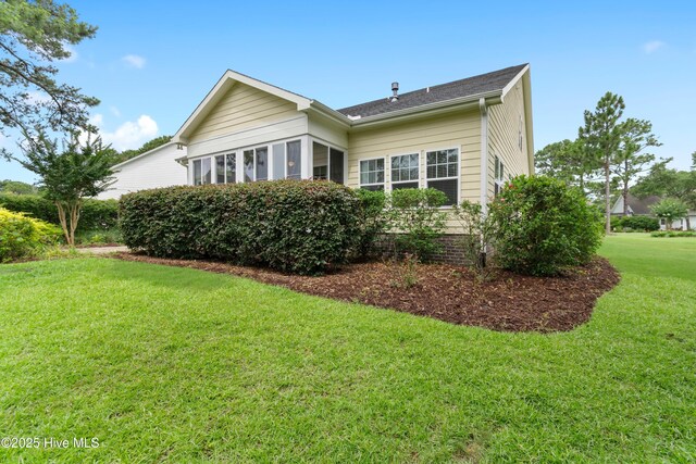 2955 Moorings Way SE, Southport, NC 28461 - view of property exterior featuring a yard