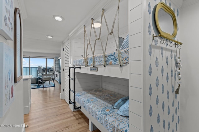 8801 Reed Dr Unit 303W, Emerald Isle, NC 28594 - bedroom with light wood-type flooring and recessed lighting